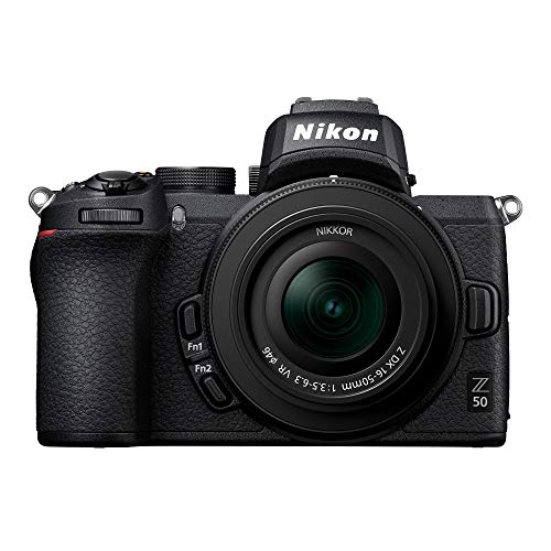 Compact mirrorless camera with wide-angle and telephoto zoom lenses Q492625